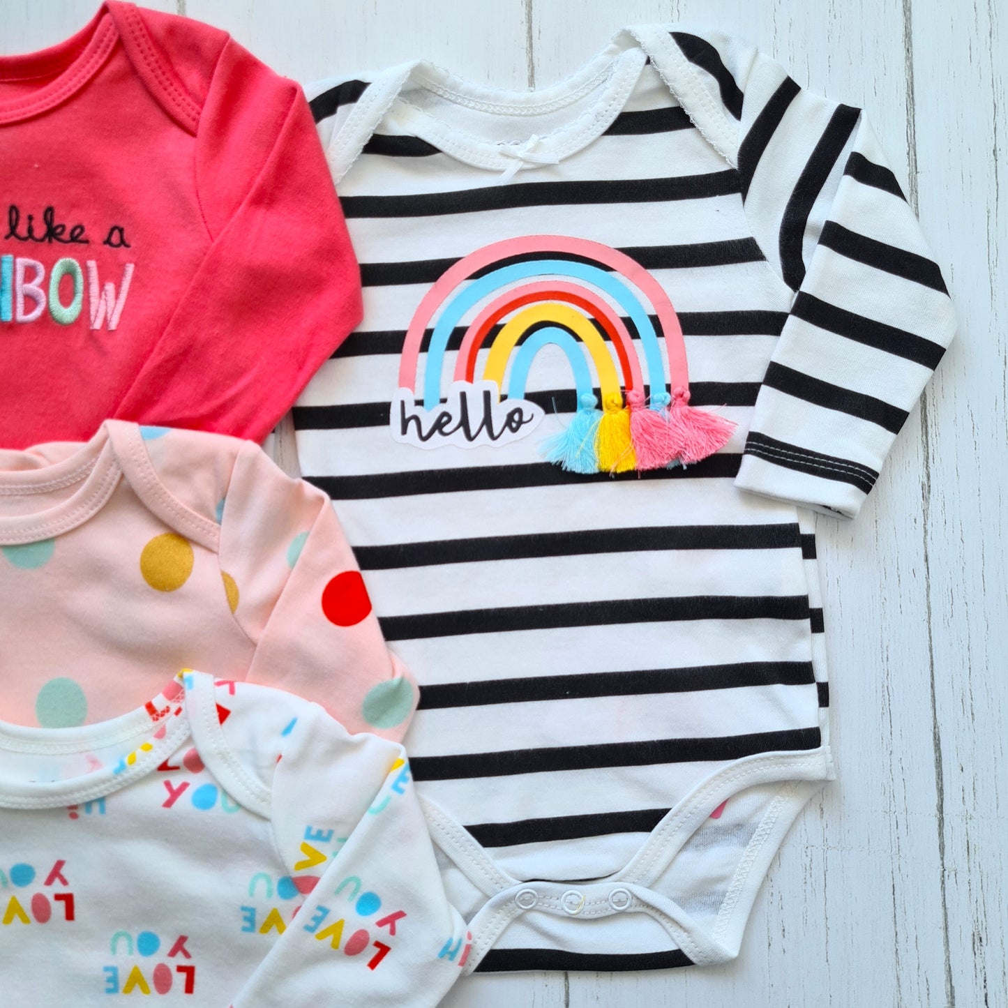 Set de 4 bodies manga larga 100% algodón para bebé niña - Modelitos arcoíris