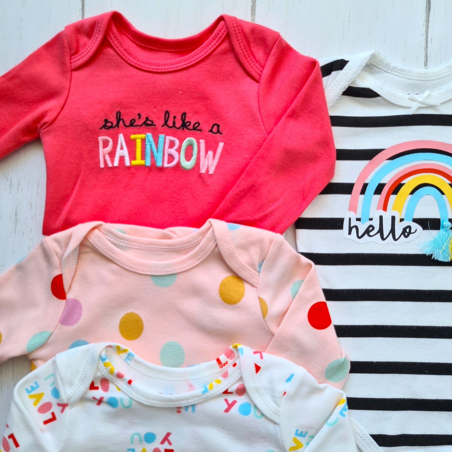 Set de 4 bodies manga larga 100% algodón para bebé niña - Modelitos arcoíris