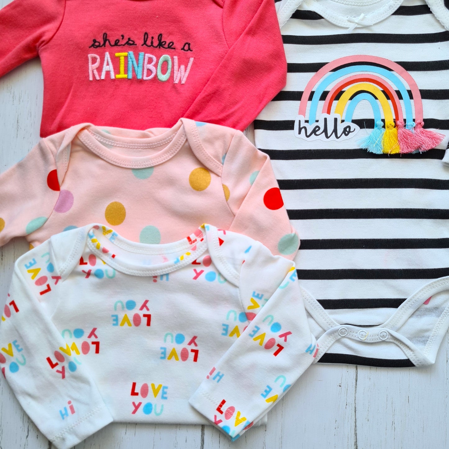 Set de 4 bodies manga larga 100% algodón para bebé niña - Modelitos arcoíris