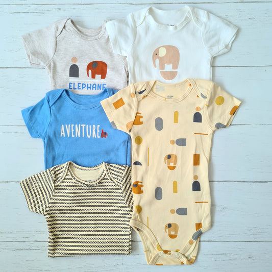 Set de 5 bodies manga corta 100% algodón para bebé - ¡Últimas unidades disponibles!